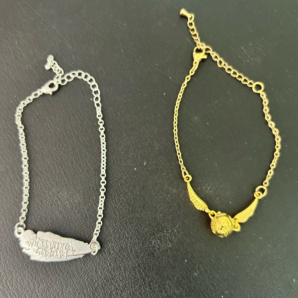 Pair Of Harry Potter Bracelets Golden Snitch & Wingardium Leviosa